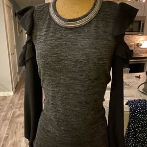 Soft blouse with sheer black sleeve